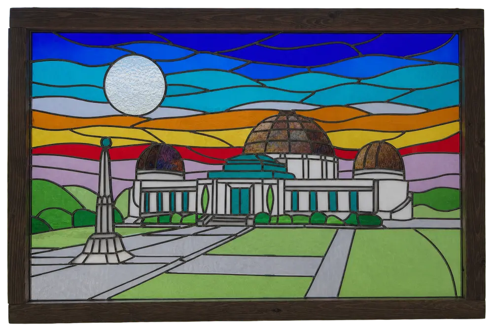 A stained glass window depicting the Griffith Observatory.